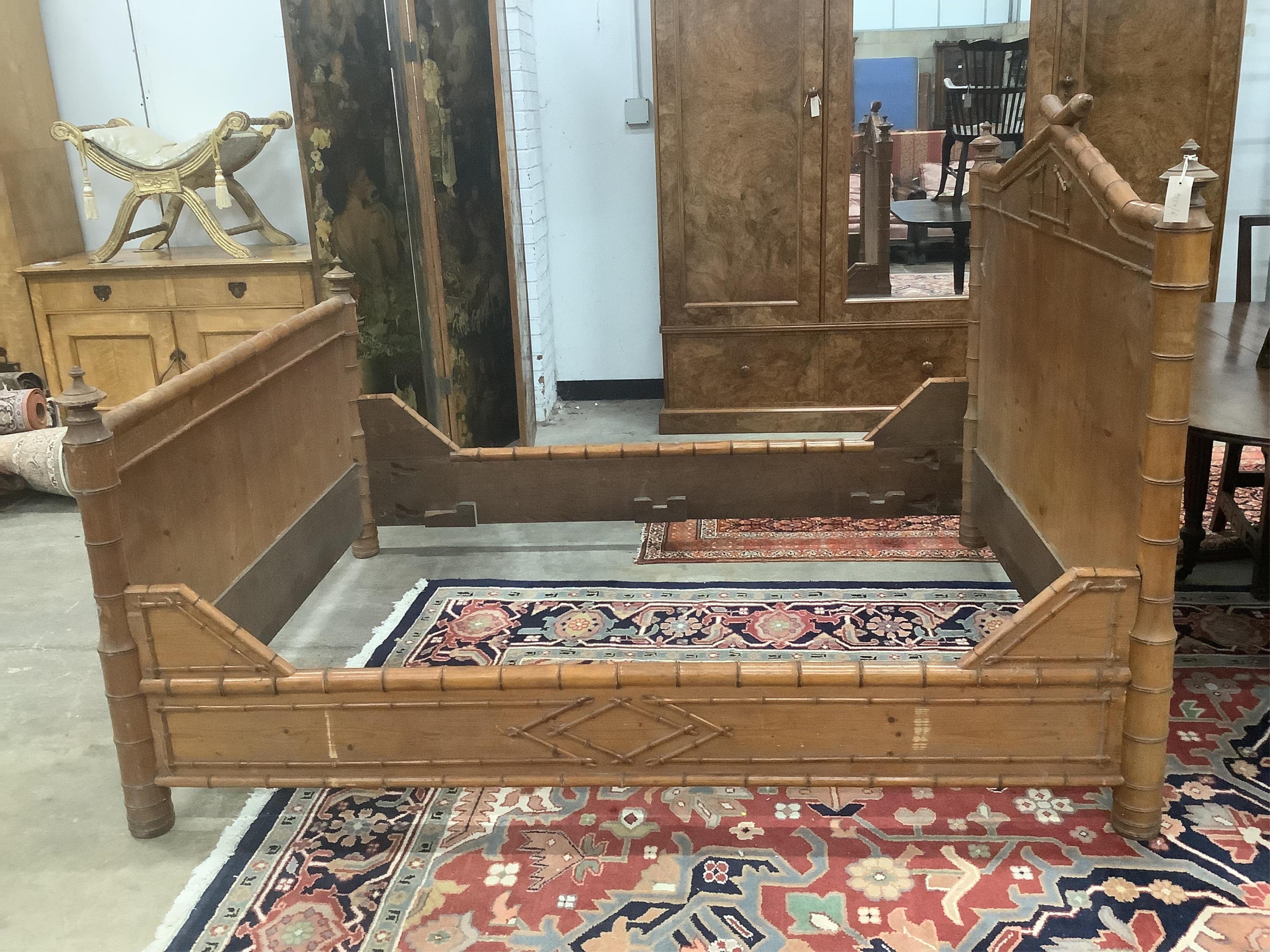 A 19th century French pine faux bamboo double bedframe, width 150cm, length 190cm, height 130cm. Condition - fair